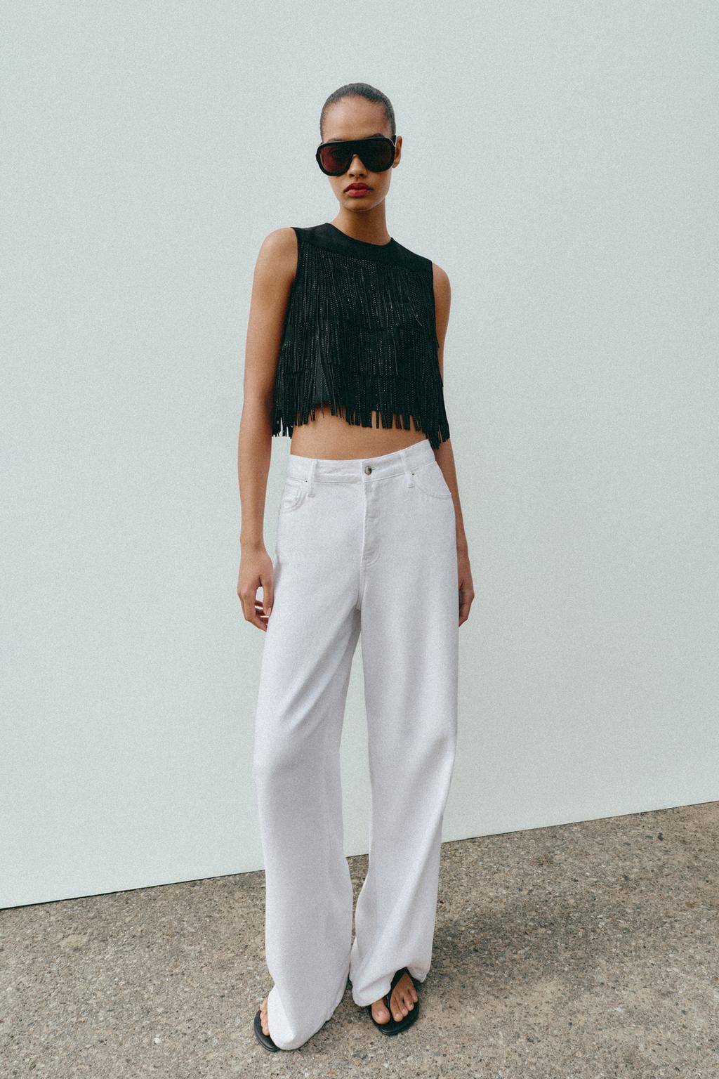 ТОП ИЗ ИСКУССТВЕННОЙ ЗАМШИ С БАХРОМОЙ И ЗАКЛЕПКАМИ