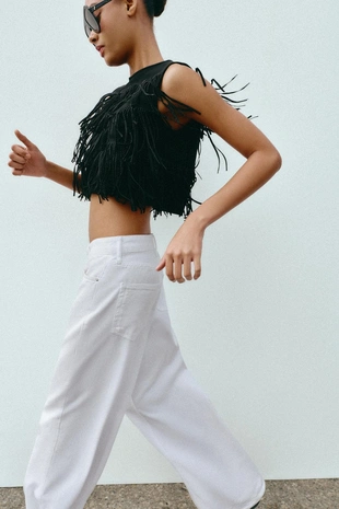 Топ из искусственной замши с бахромой и заклепками- Заказать в России