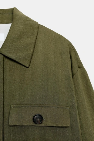 Укороченная куртка с подвернутыми рукавами