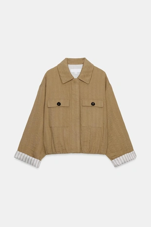 Укороченная куртка с подвернутыми рукавами