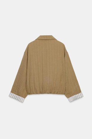 Укороченная куртка с подвернутыми рукавами- Заказать в России