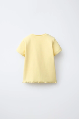 Футболка в рубчик с нашивкой- Заказать в России