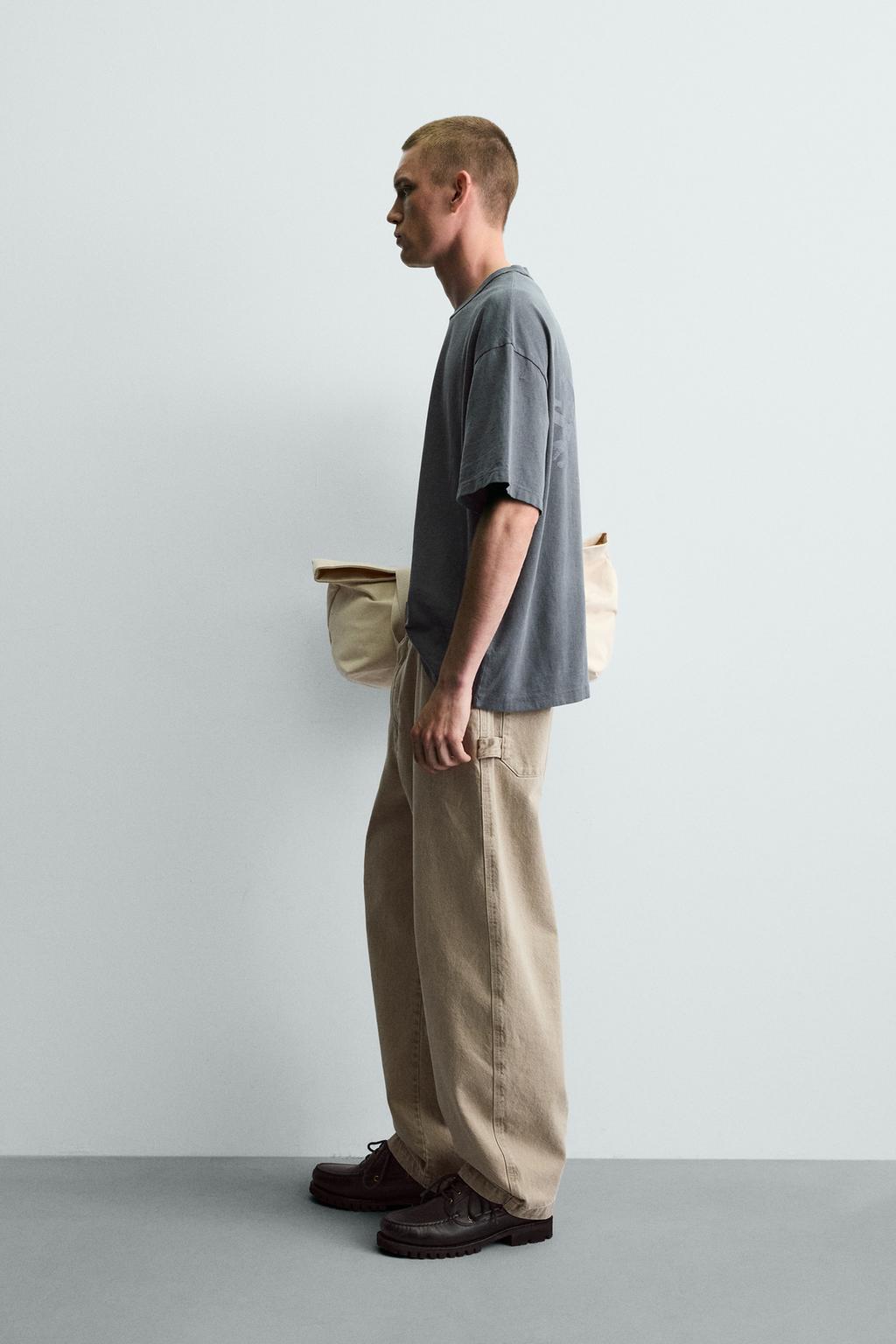 ФУТБОЛКА С ЭФФЕКТОМ ПОТЕРТОСТИ И КОНТРАСТНЫМ ПРИНТОМ