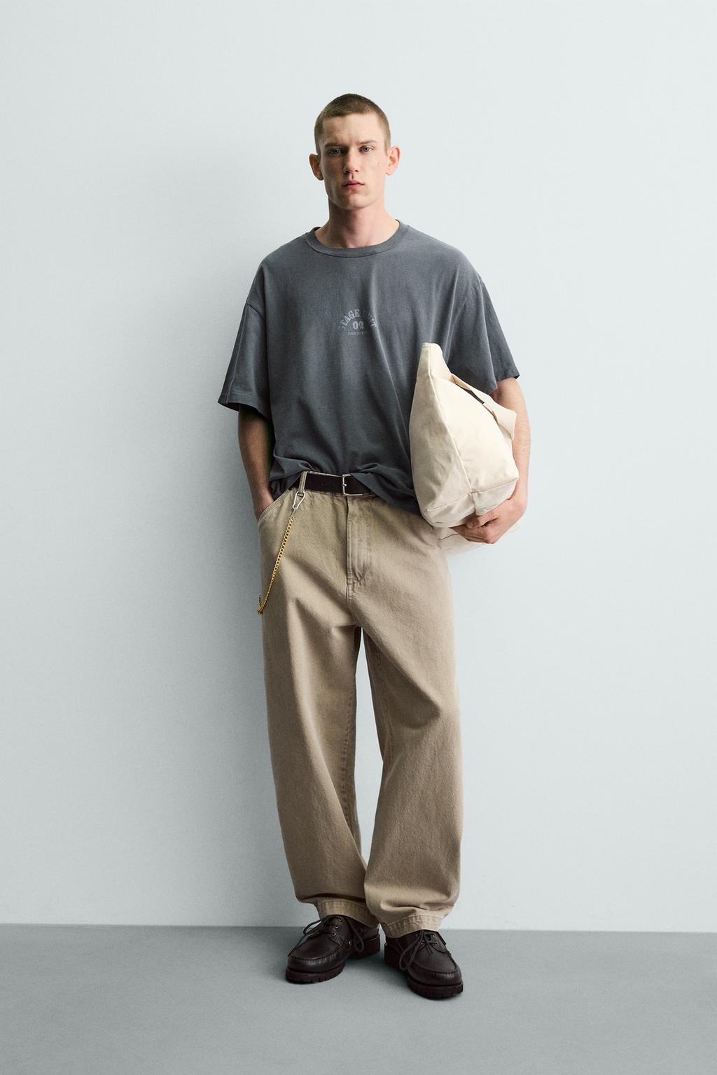 ФУТБОЛКА С ЭФФЕКТОМ ПОТЕРТОСТИ И КОНТРАСТНЫМ ПРИНТОМ