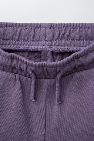 Бермуды с эффектом Garment Dye и нашивкой