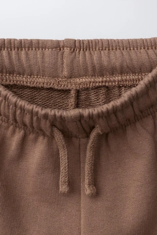 Шорты-бермуды базовые с текстовым принтом- Заказать в России