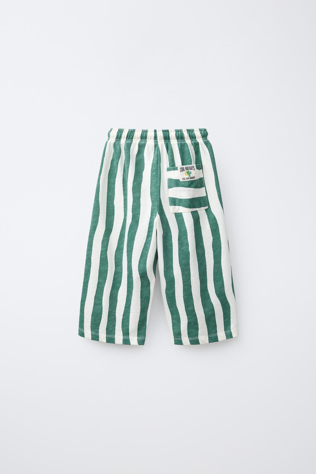 БРЮКИ В ВОЛНИСТУЮ ПОЛОСКУ