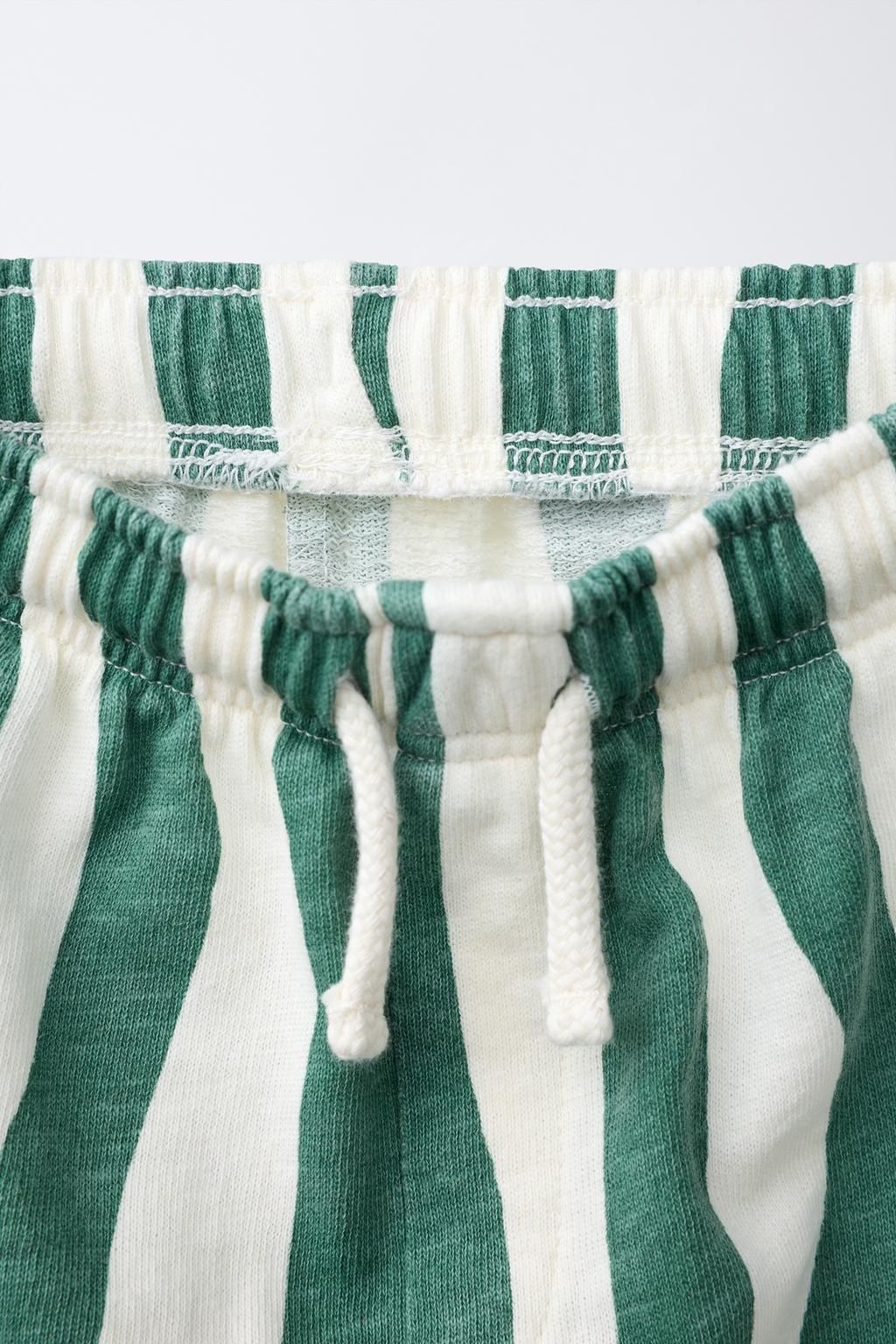 БРЮКИ В ВОЛНИСТУЮ ПОЛОСКУ