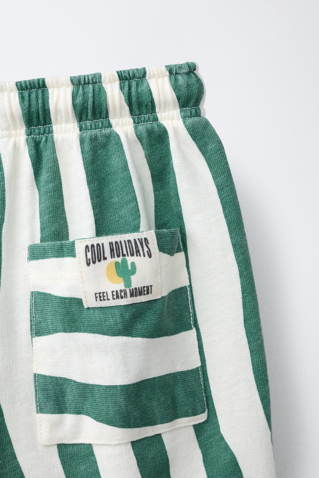 БРЮКИ В ВОЛНИСТУЮ ПОЛОСКУ