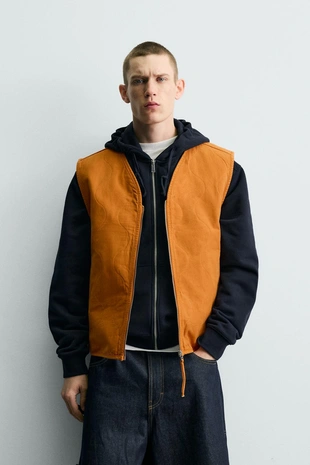 Жилет с эффектом потертости- Заказать в России
