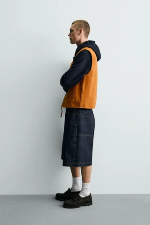 Жилет с эффектом потертости- Заказать в России