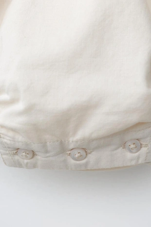 Комбинезон с вышитым цветком- Заказать в России