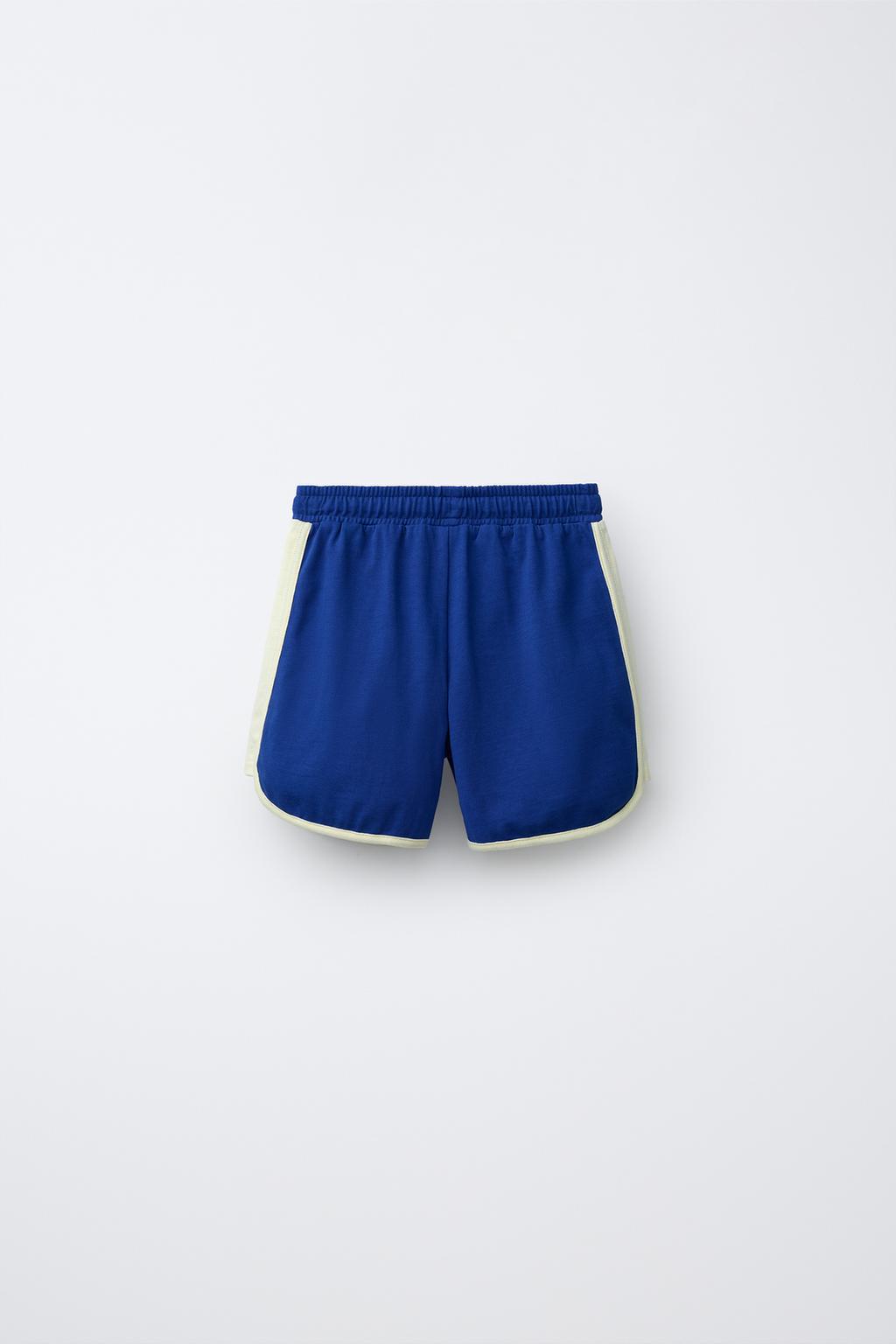 ШОРТЫ ИЗ МЯГКОЙ ТКАНИ С КОНТРАСТНЫМИ ДЕТАЛЯМИ