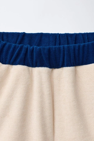 Шорты-бермуды из махровой ткани с контрастными деталями- Заказать в России