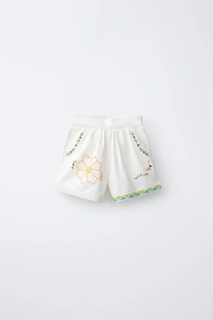 Шорты из хлопка и льна с вышивкой цветов- Заказать в России