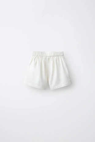 Шорты из хлопка и льна с вышивкой цветов- Заказать в России