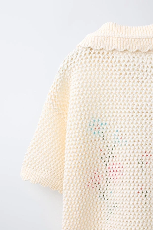 Вышитое трикотажное поло- Заказать в России