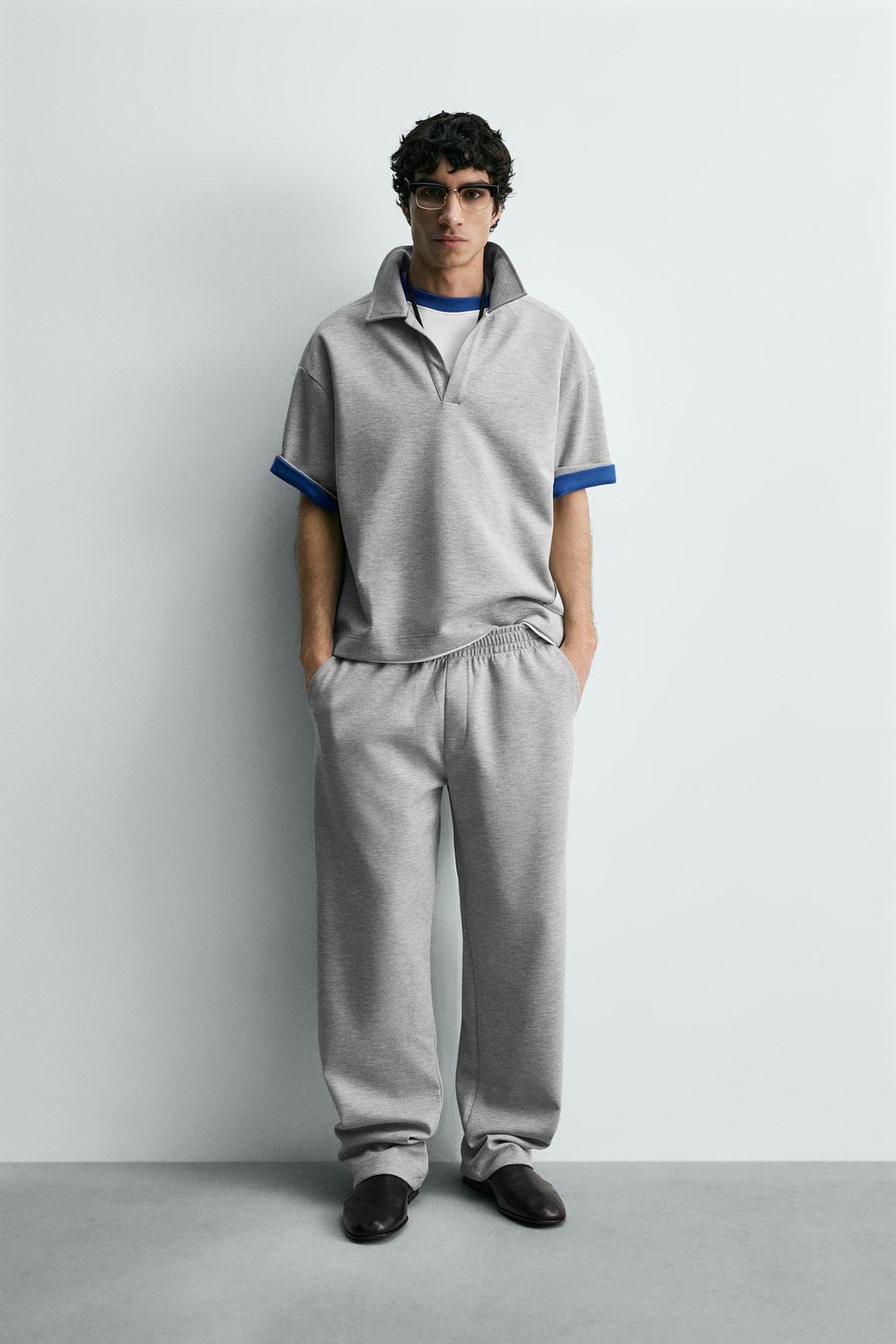 БРЮКИ С НАШИВКОЙ И ЭТИКЕТКОЙ