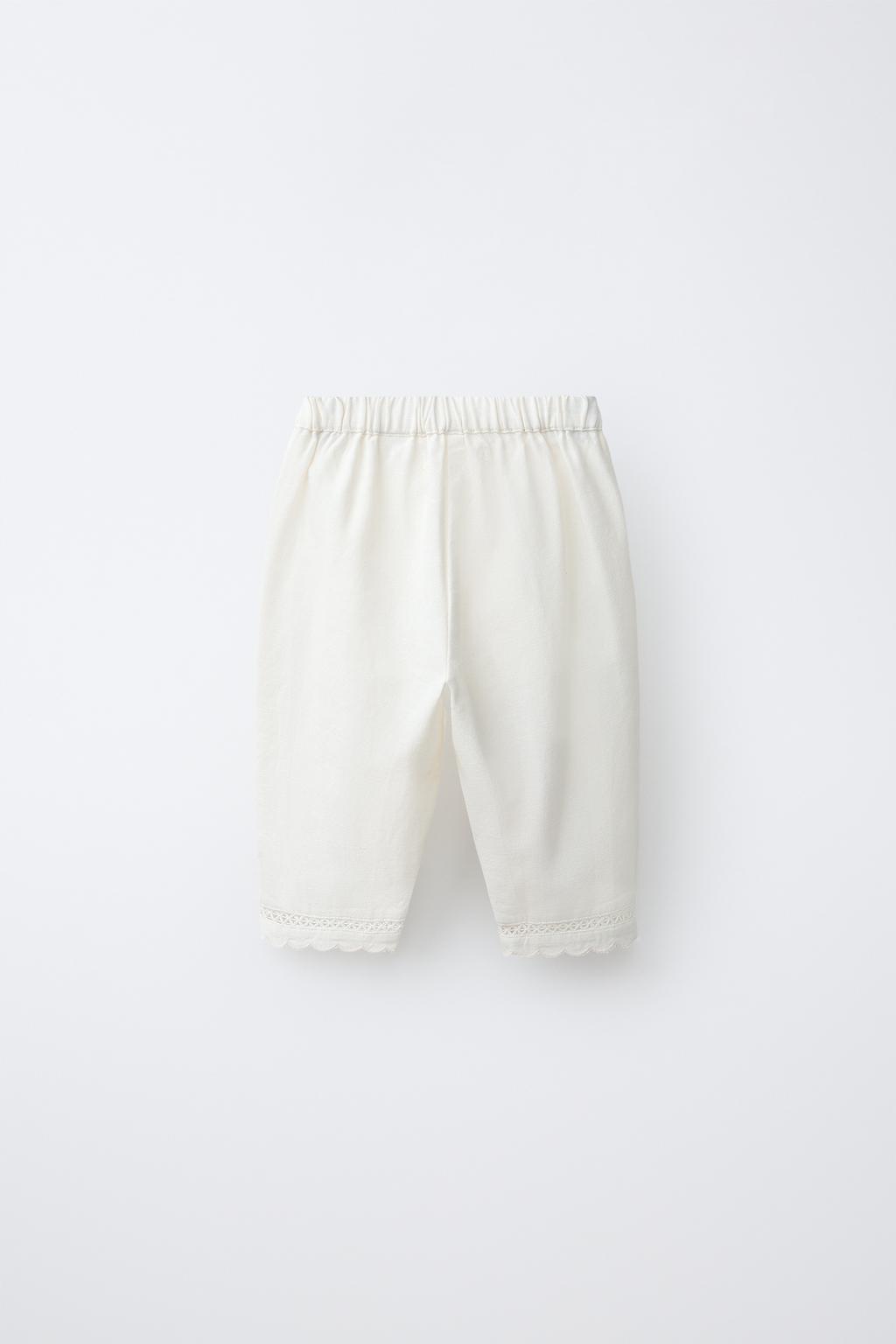 БРЮКИ С ВЫШИВКОЙ