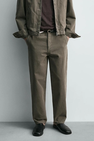 Брюки Relaxed Fit с эффектом потертости- Заказать в России
