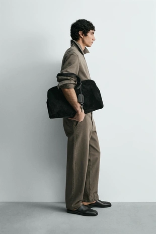 Брюки Relaxed Fit с эффектом потертости- Заказать в России