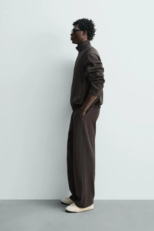 Джоггеры из трикотажа с эффектом потертости- Заказать в России