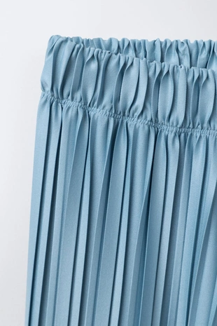 Плиссированные брюки