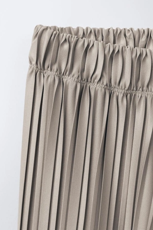 Плиссированные брюки