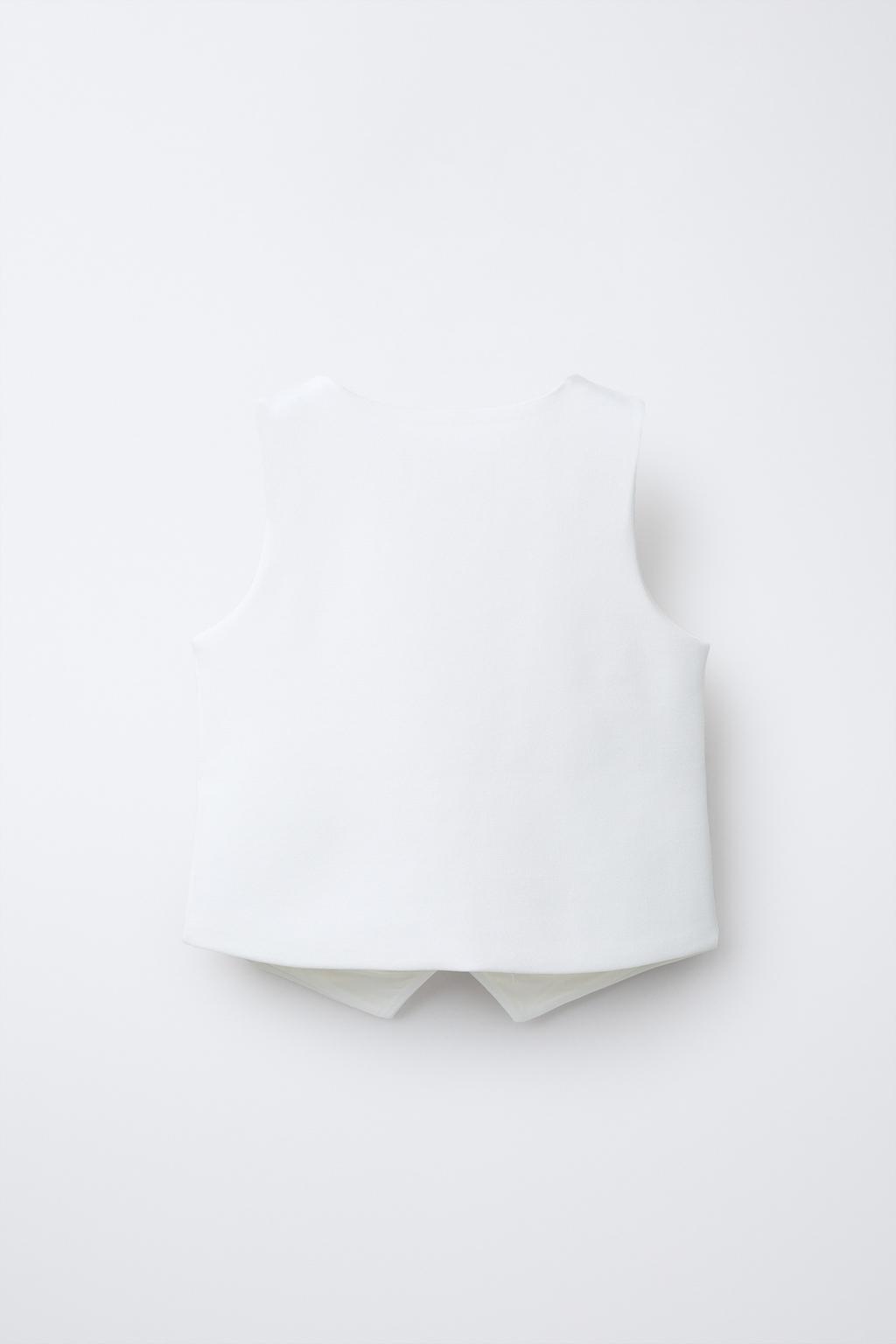 ЖИЛЕТ С ДЕКОРАТИВНЫМИ ПУГОВИЦАМИ