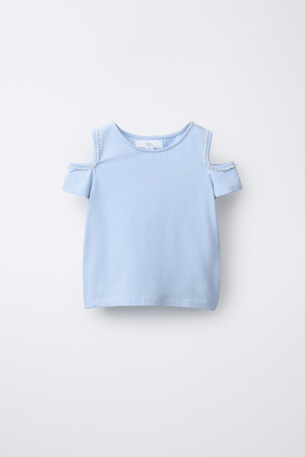 ФУТБОЛКА С ВЫРЕЗАМИ И БУСИНАМИ