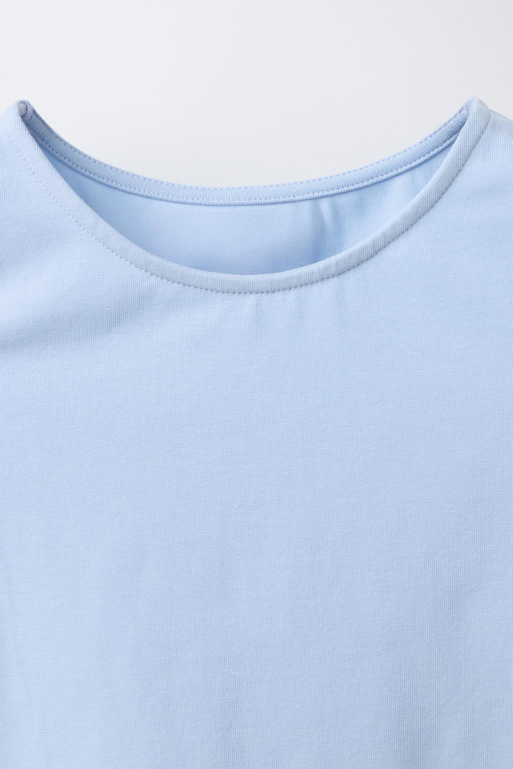 ФУТБОЛКА С ВЫРЕЗАМИ И БУСИНАМИ