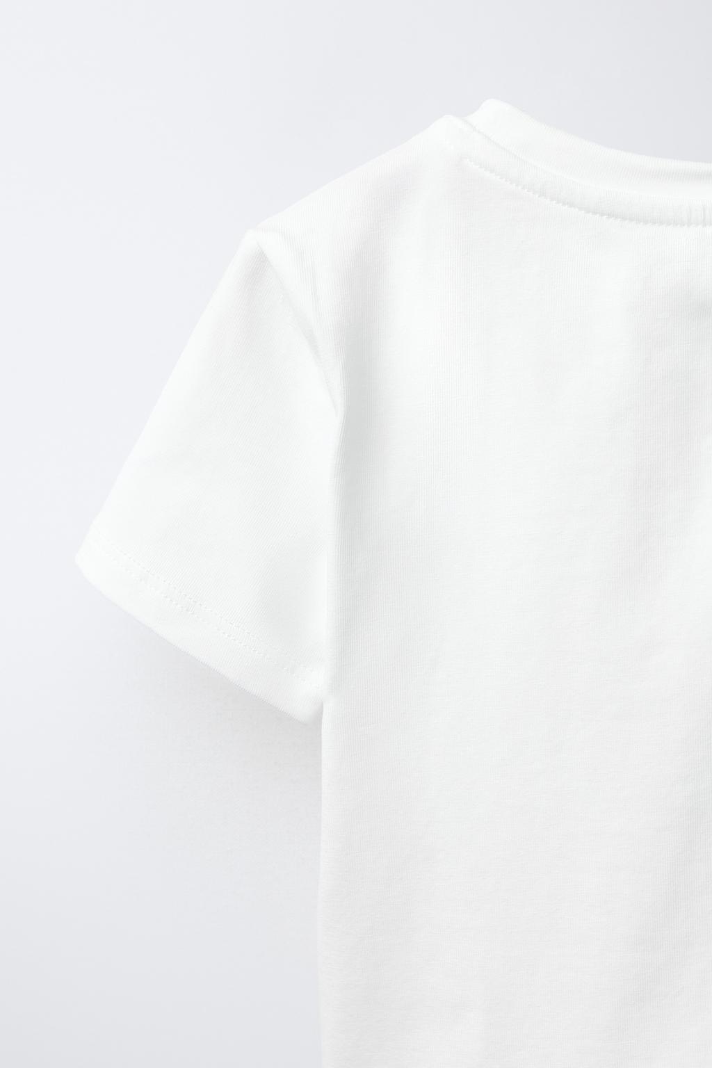 ФУТБОЛКА С БАНТОМ И БУСИНАМИ