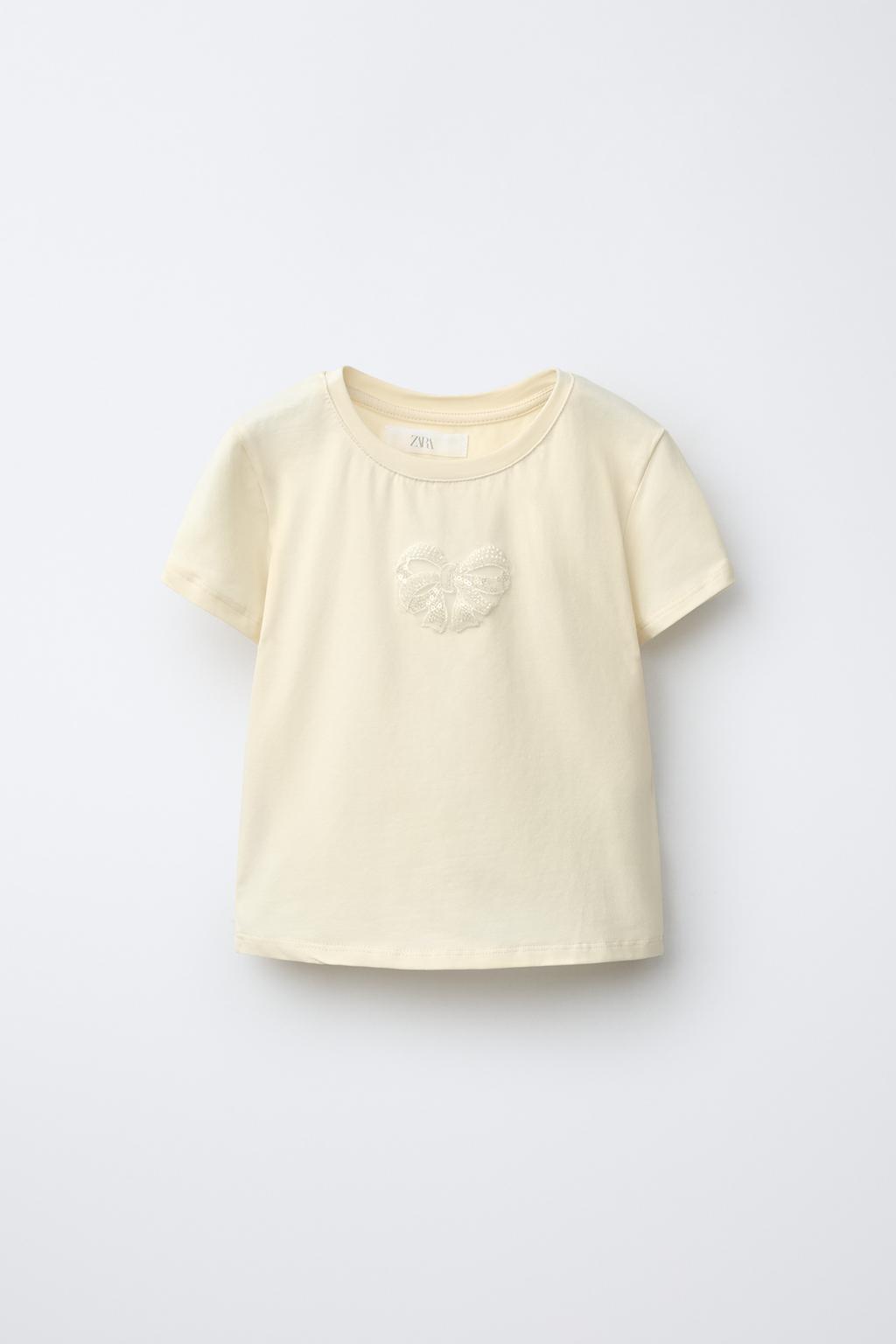 ФУТБОЛКА С БАНТОМ И БУСИНАМИ