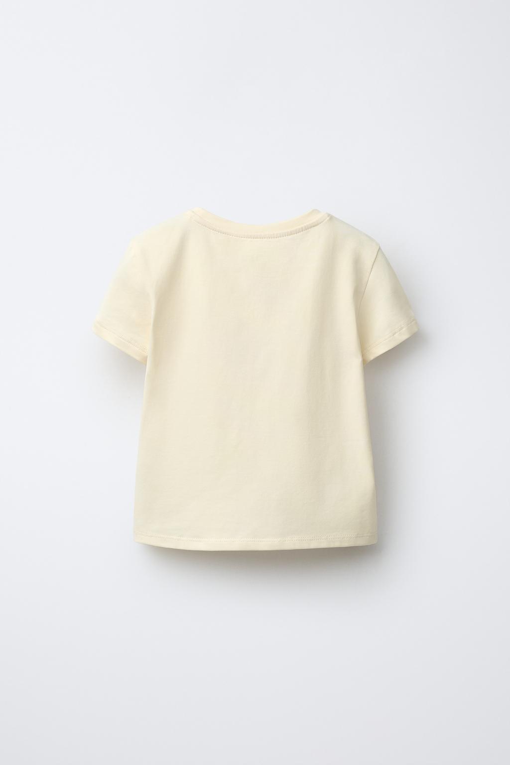 ФУТБОЛКА С БАНТОМ И БУСИНАМИ