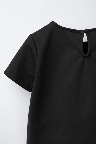 Футболка из трикотажа «рома» с цветком- Заказать в России