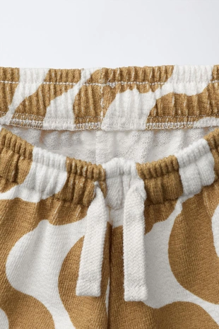 Комплект из футболки колорблок и шортов с волнами- Заказать в России