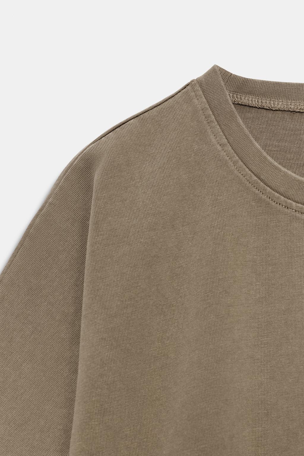 УКОРОЧЕННЫЙ ТОП С ЭФФЕКТОМ ПОТЕРТОСТИ