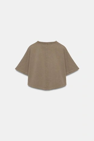 Укороченный топ с эффектом потертости- Заказать в России