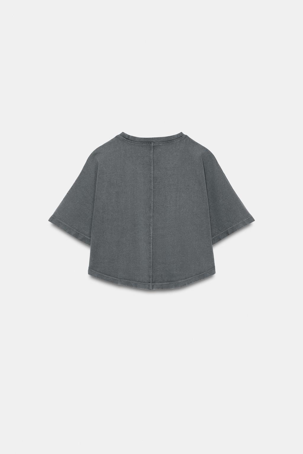 УКОРОЧЕННЫЙ ТОП С ЭФФЕКТОМ ПОТЕРТОСТИ