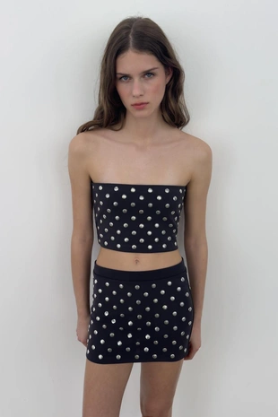 Мини-юбка с заклепками- Заказать в России