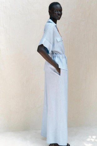 Брюки широкого кроя из льна- Заказать в России