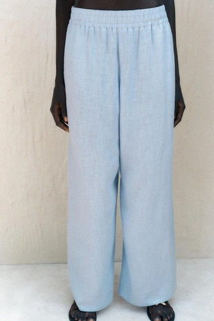 Брюки широкого кроя из льна- Заказать в России