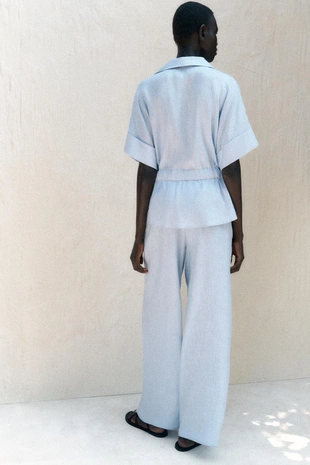 Брюки широкого кроя из льна- Заказать в России