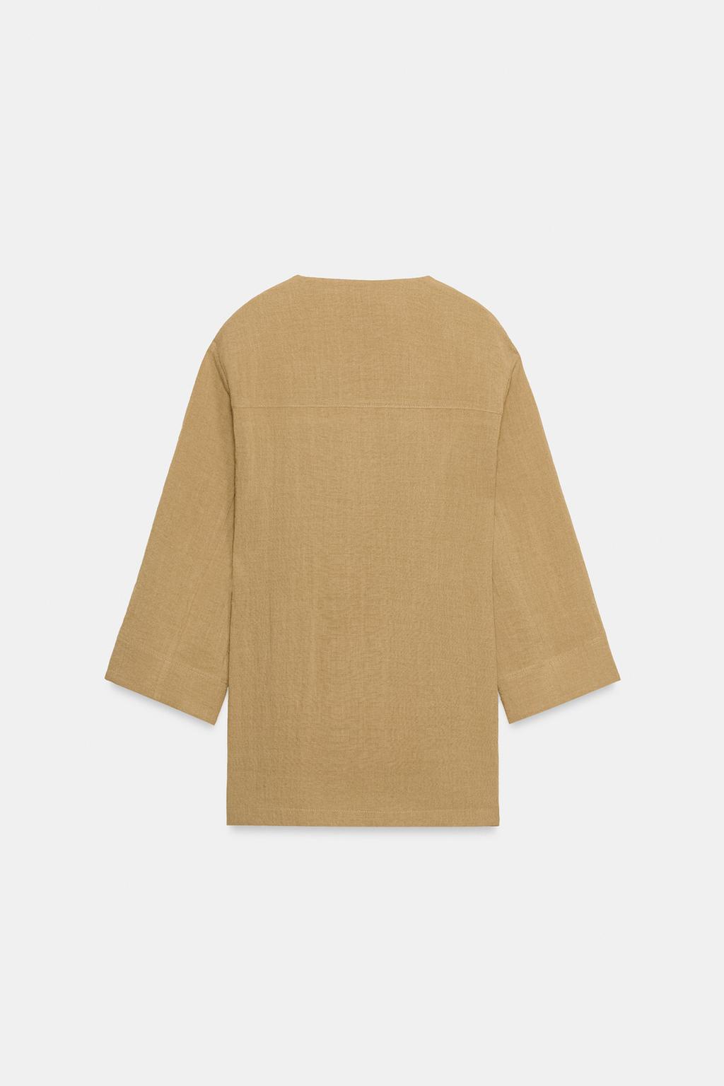 ДВУБОРТНЫЙ ЖАКЕТ С БОКОВЫМИ РАЗРЕЗАМИ