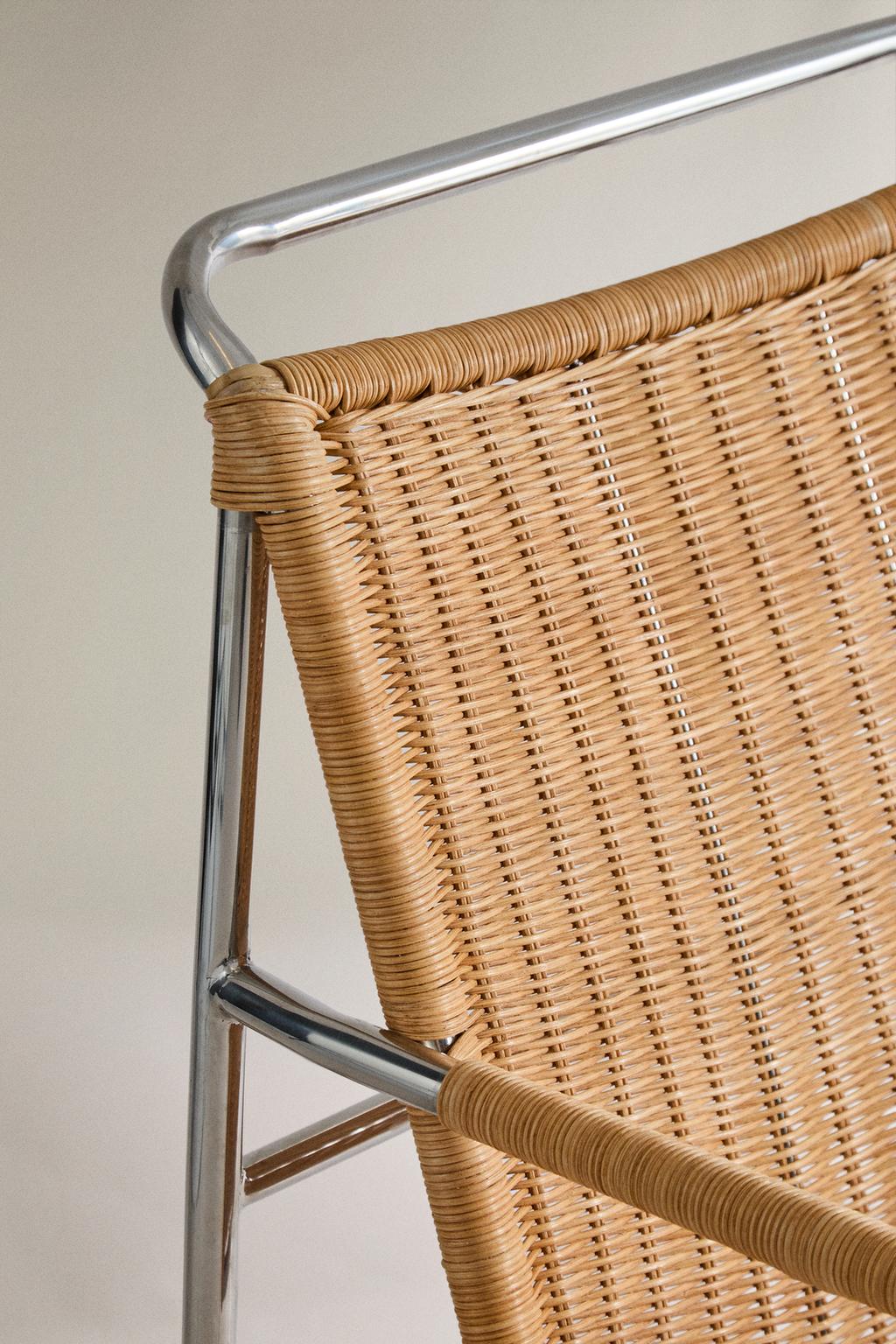 Кресло с элементами ротанга и стали