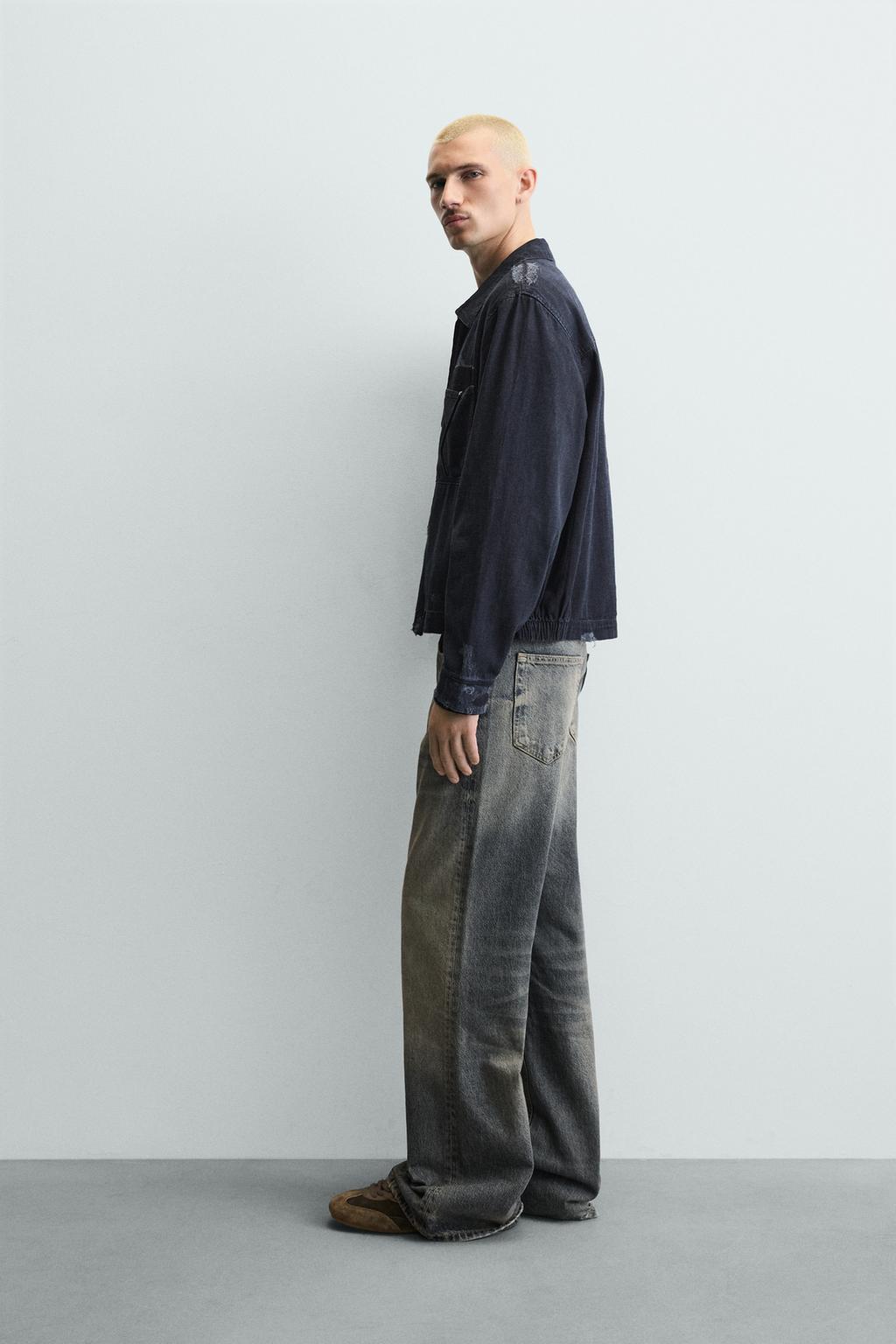 УКОРОЧЕННАЯ КУРТКА С ЭФФЕКТОМ РВАНЫХ ДЕТАЛЕЙ