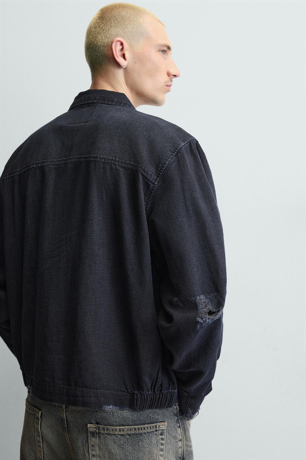 УКОРОЧЕННАЯ КУРТКА С ЭФФЕКТОМ РВАНЫХ ДЕТАЛЕЙ