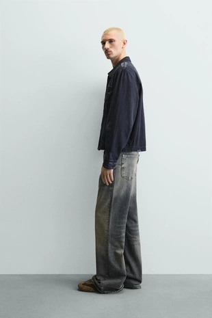 Укороченная куртка с эффектом рваных деталей- Заказать в России