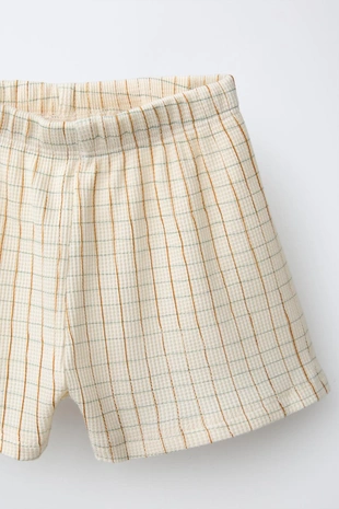 Комплект из футболки и шортов в клетку- Заказать в России