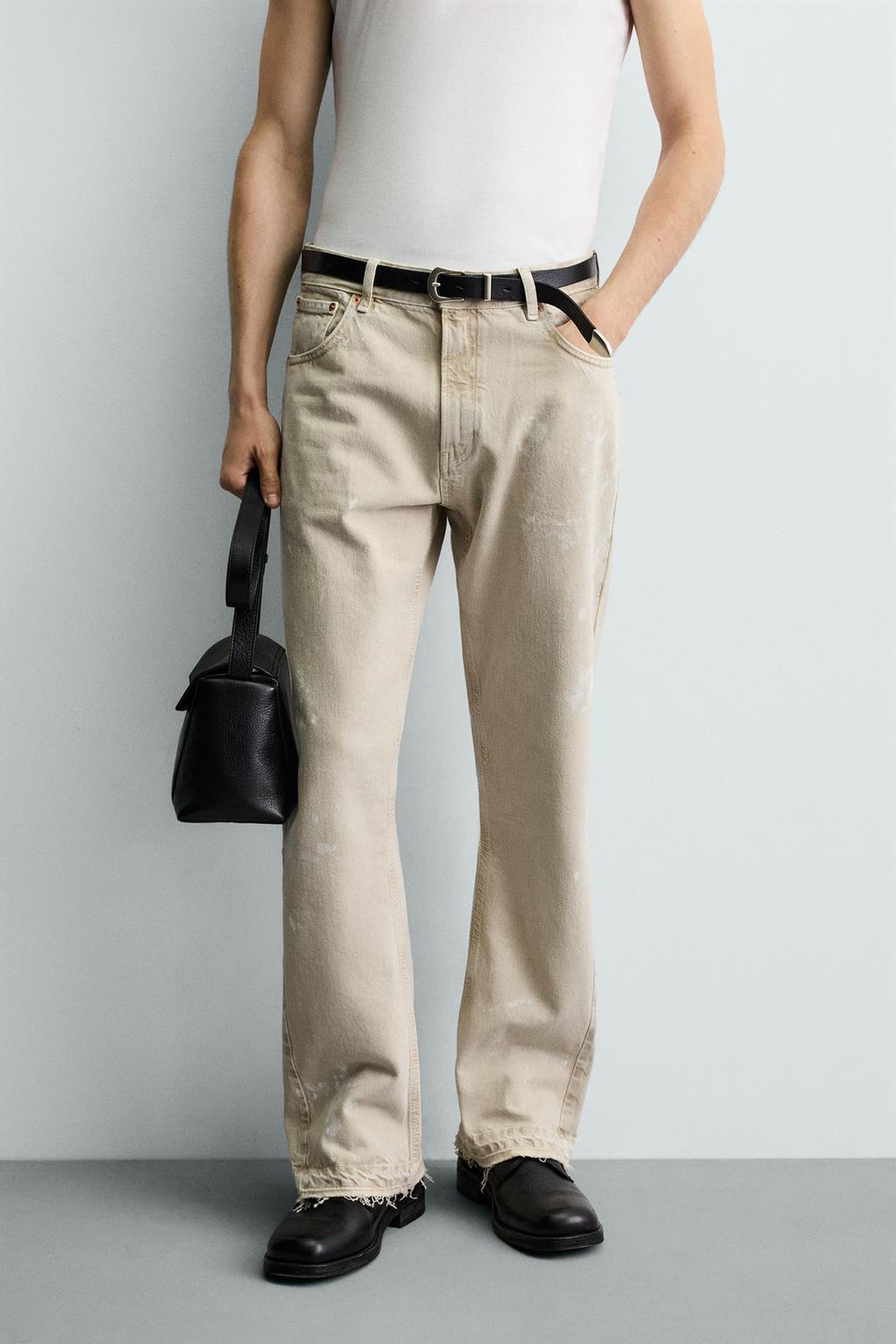 ДЖИНСЫ FLARE FIT С ЭФФЕКТОМ БРЫЗГ